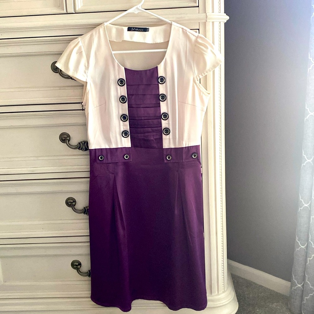 Beautiful and spotless purple dress. Knee length.